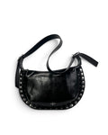 Bolso negro tachas