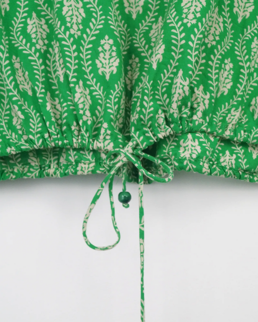 Blusa verde floreada