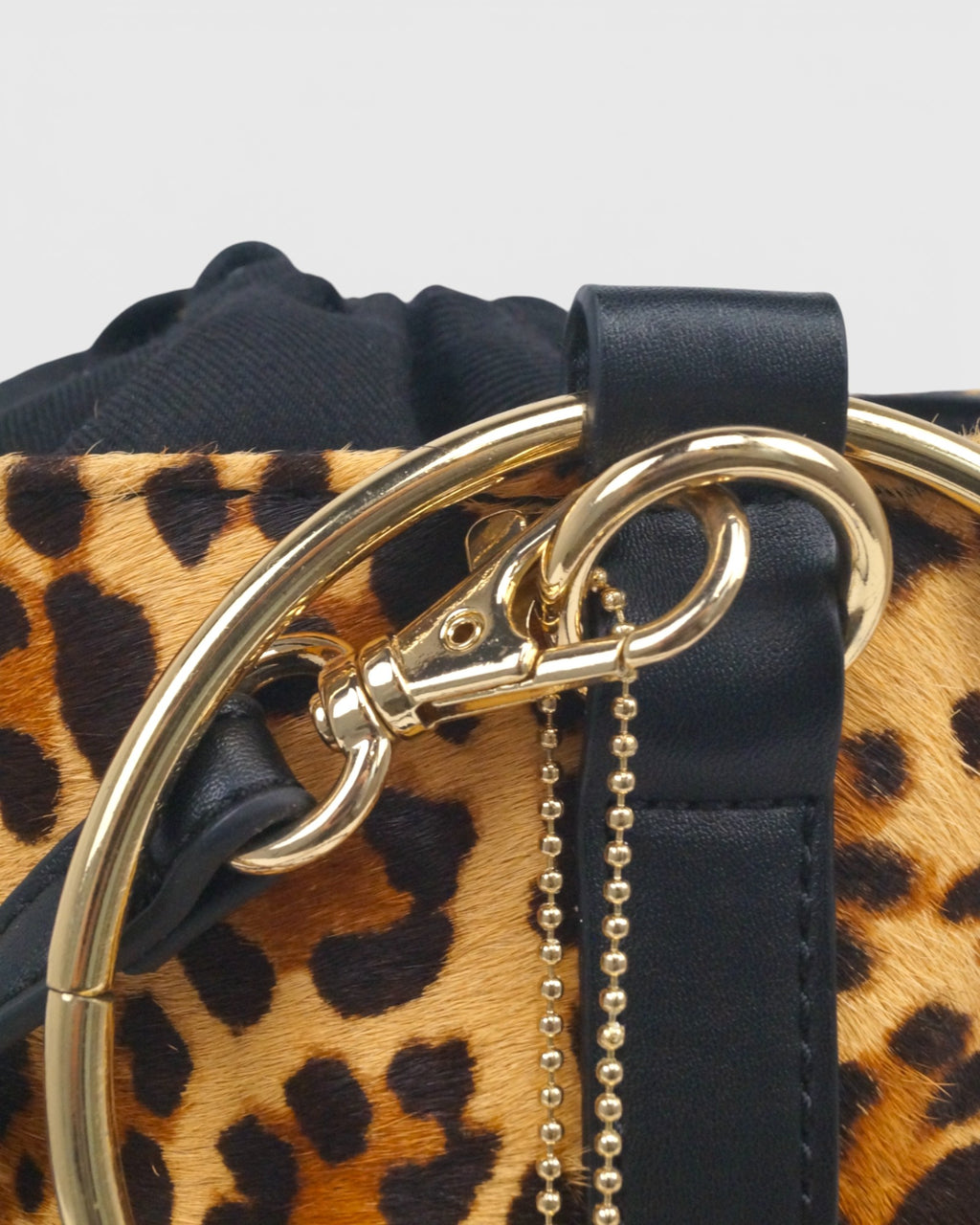 Bolso saco animal print piel
