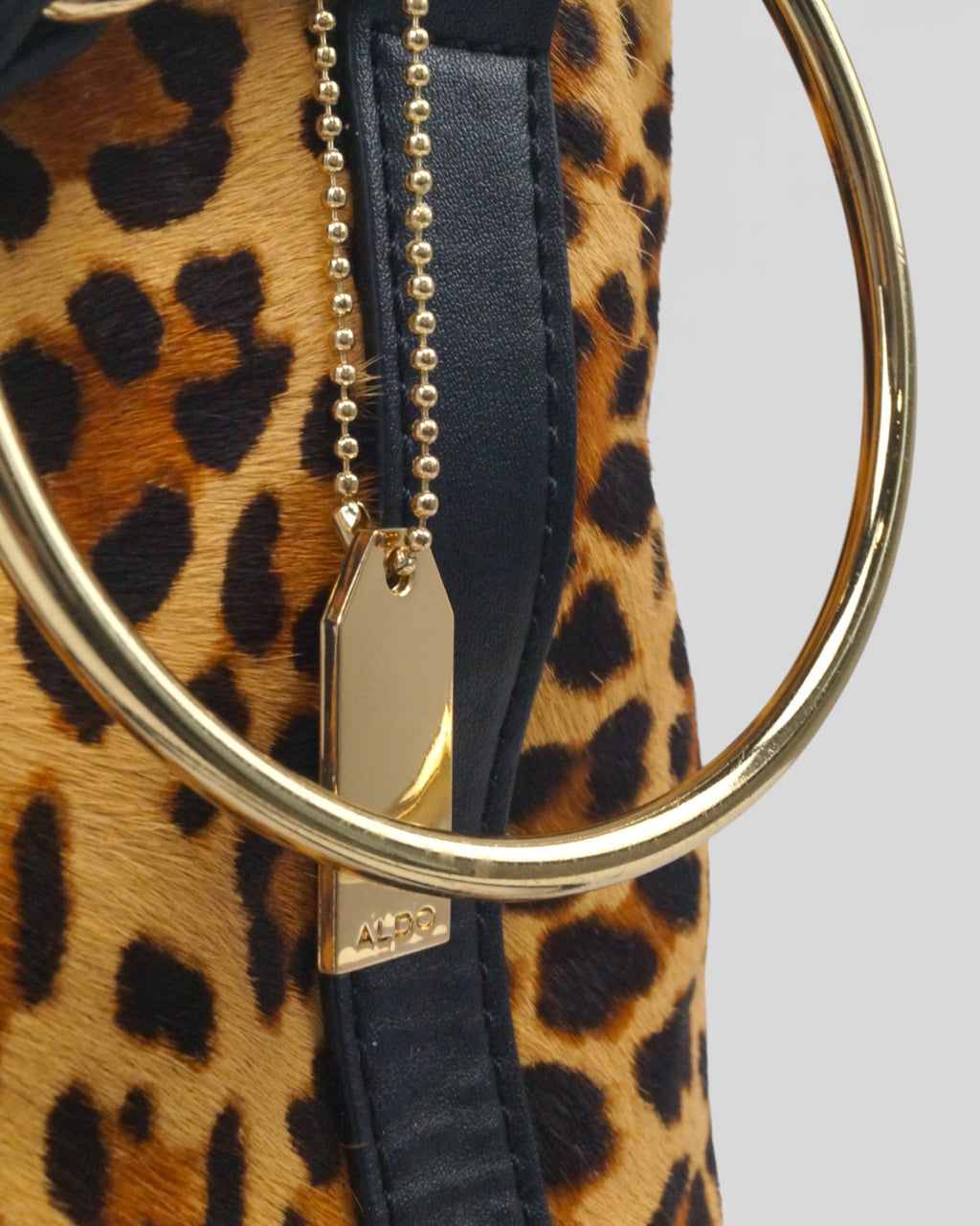 Bolso saco animal print piel