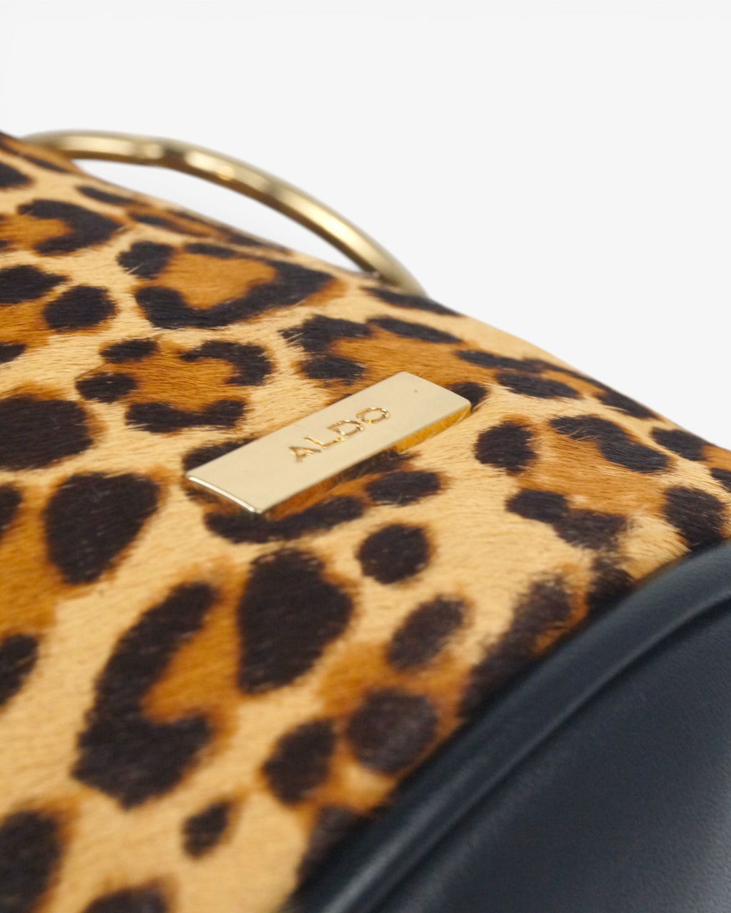 Bolso saco animal print piel