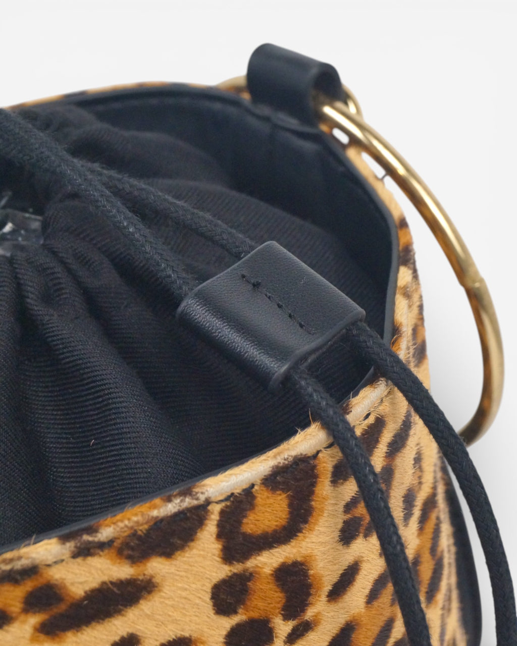 Bolso saco animal print piel