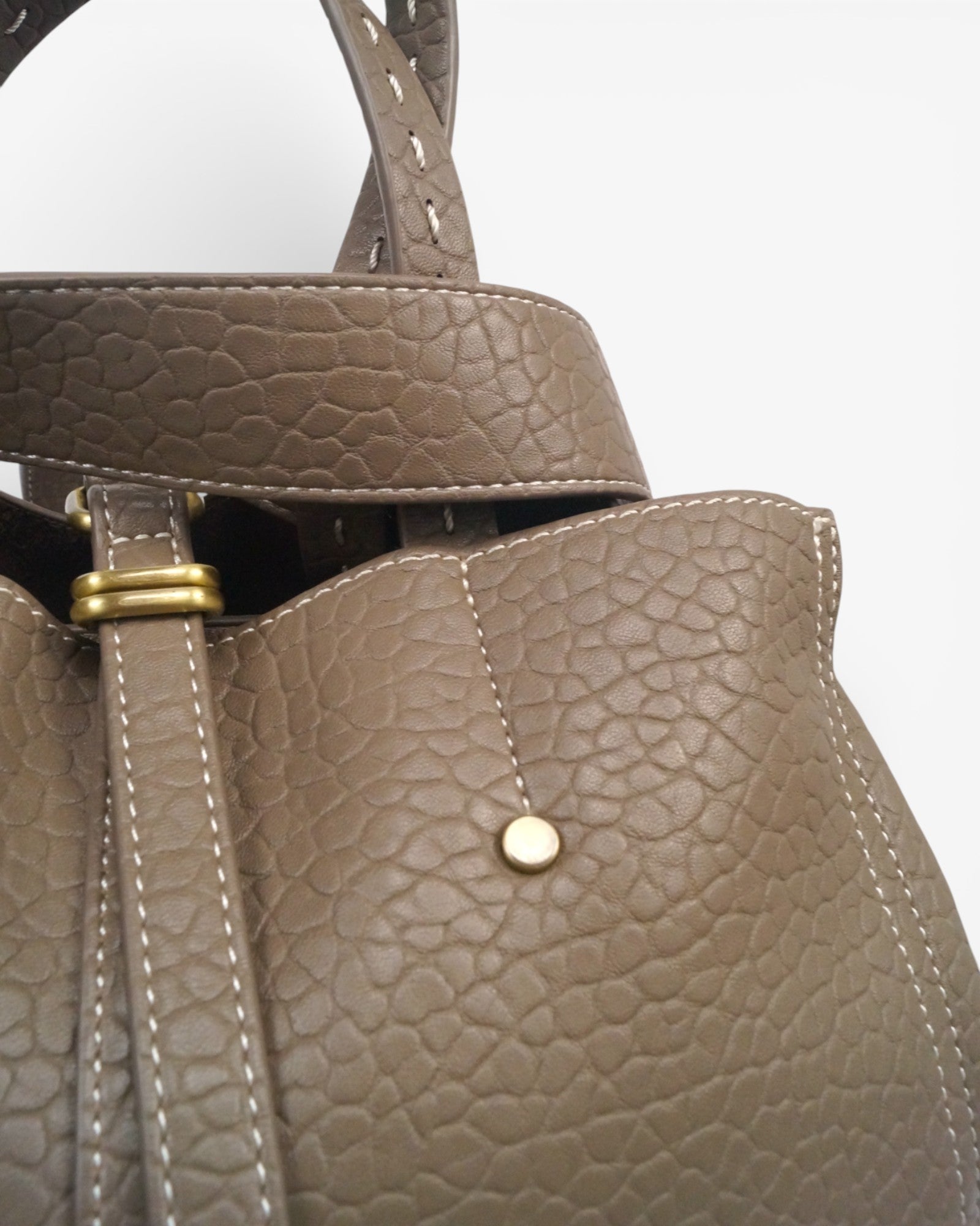 Bolso cruzado y mano