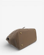 Bolso cruzado y mano