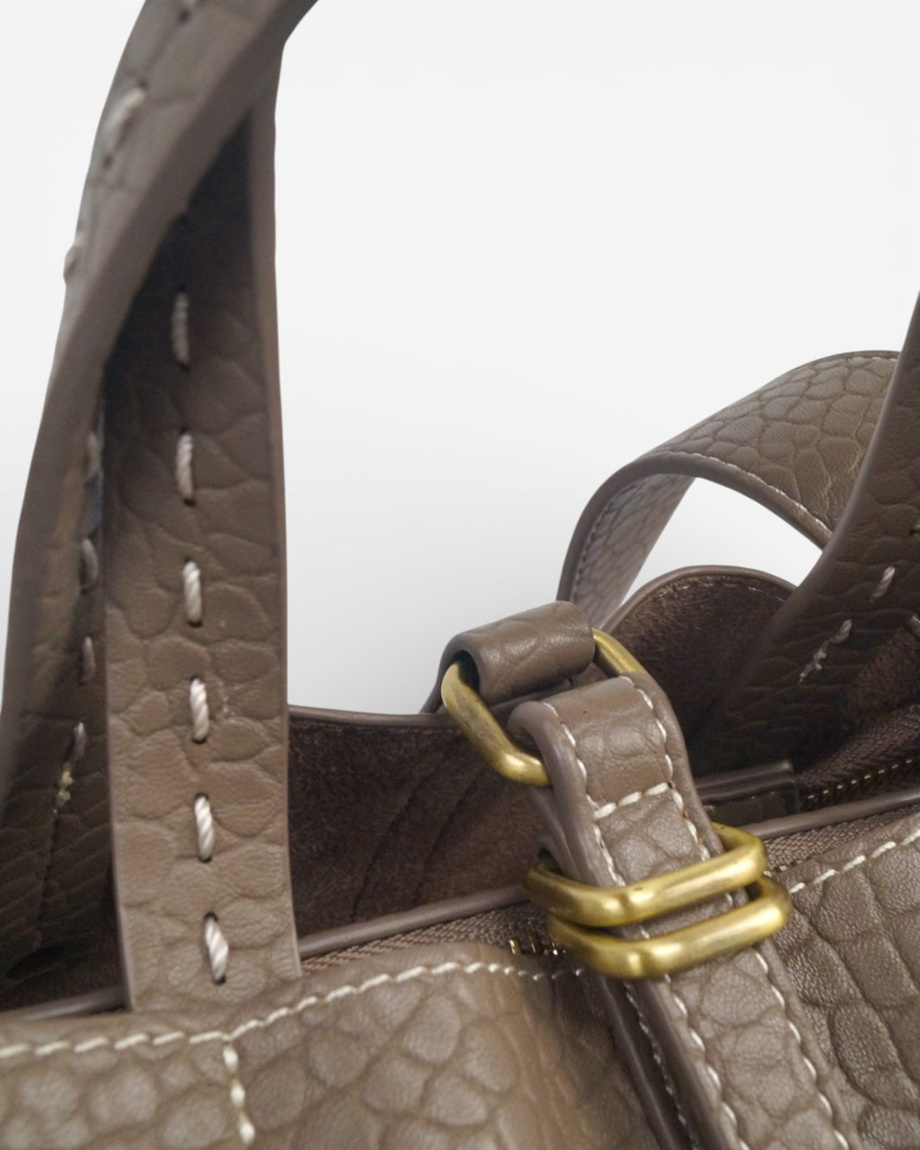 Bolso cruzado y mano