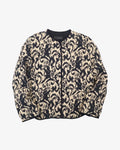 Chaqueta acolchada beige y negra