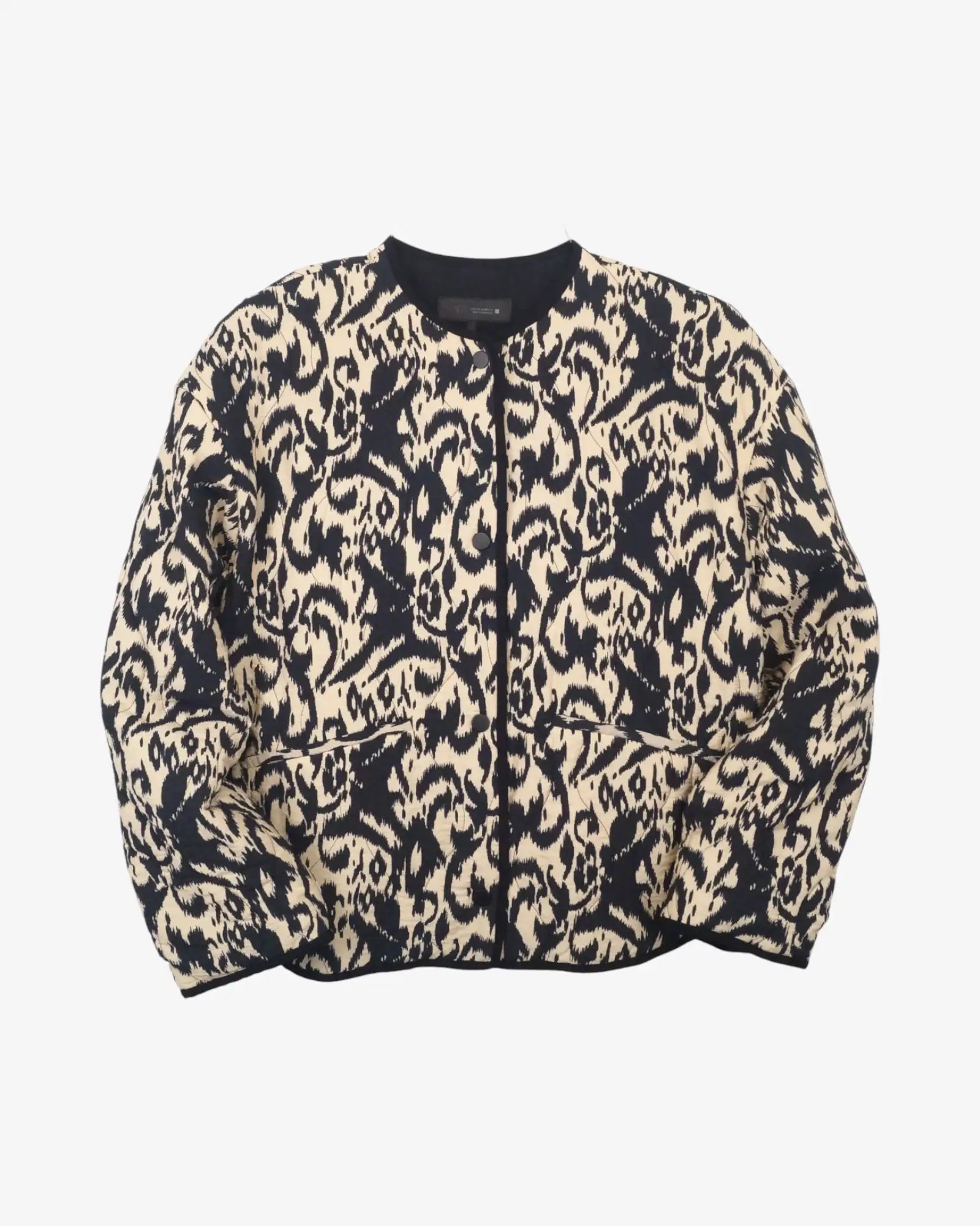 Chaqueta acolchada beige y negra