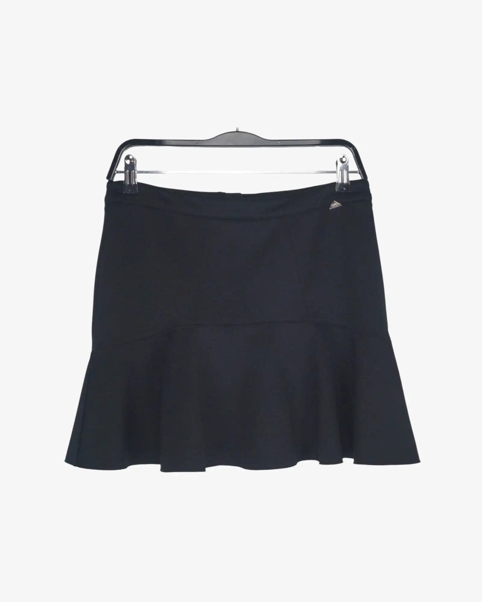 Falda corta volante
