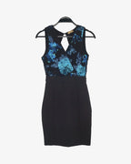 Vestido lentejuelas con faldón