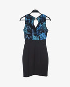 Vestido lentejuelas con faldón
