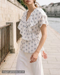 Blusa volantes blanca florecitas