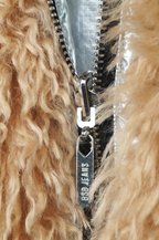 Chaleco reversible plata y peluche
