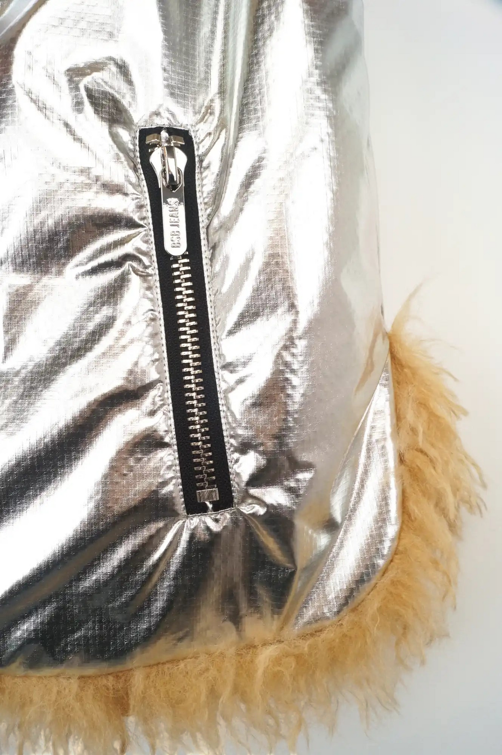 Chaleco reversible plata y peluche